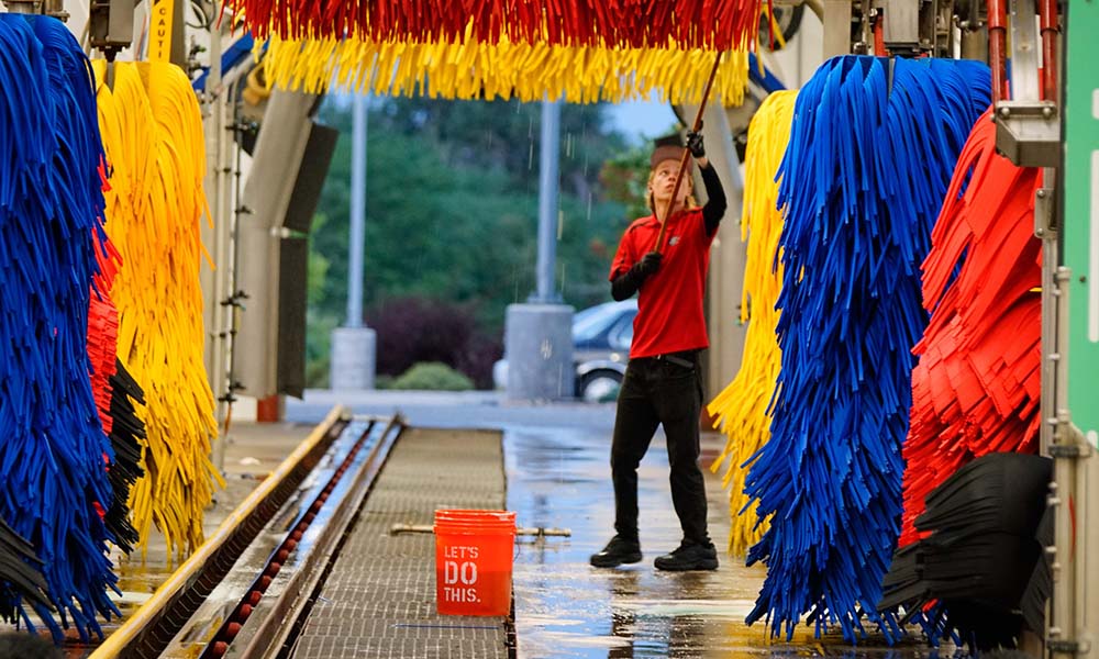 Person working at car wash