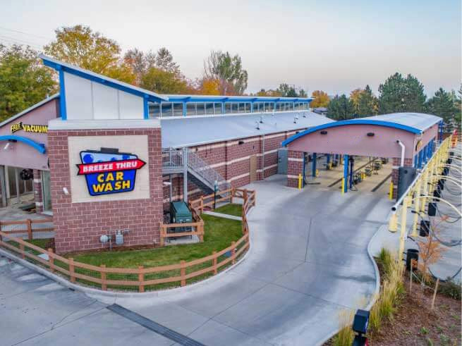 Exterior view of a car wash and car wash tunnel