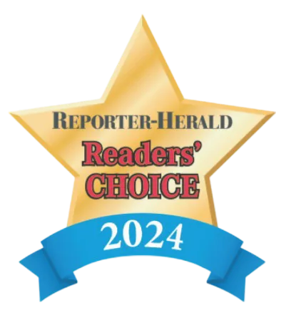 Gold star with text "Reporter-Herald Readers' Choice 2024" and a blue ribbon at the bottom.